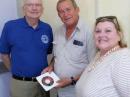 FRC President Pedro Rodríguez, CO2RP, accepts the gift of a CD version of The ARRL Antenna Book (23rd edition) from IARU Secretary David Sumner, K1ZZ, who visited FRC Headquarters on February 2 with his wife Linda, KA1ZD (right).